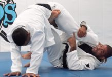 K 가드 스윕 : 더블 팬츠 그립으로 전략적 우위를 확보하다